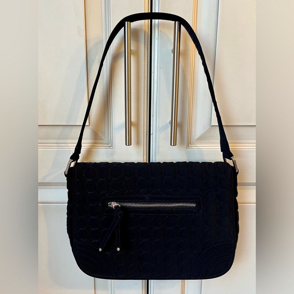 EUC Vera Bradley shoulder bag with unique exterior and interior design patterns.